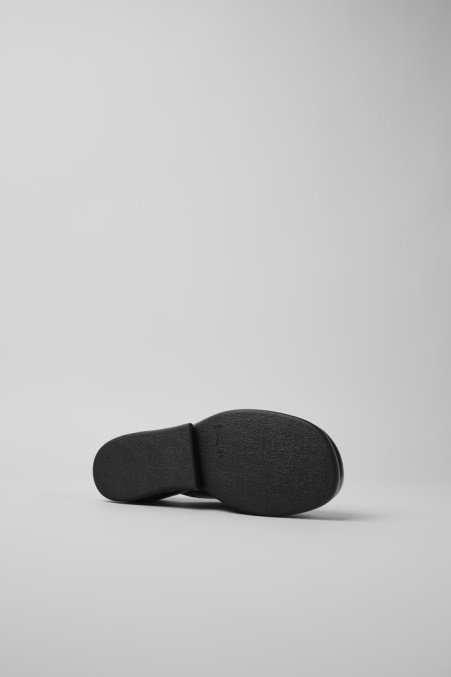 Design Kaah Schwarze Lederclogs Camper De